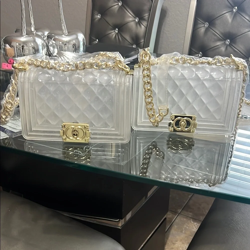 Elegant transparent padded bag with golden details are two bags for only 35